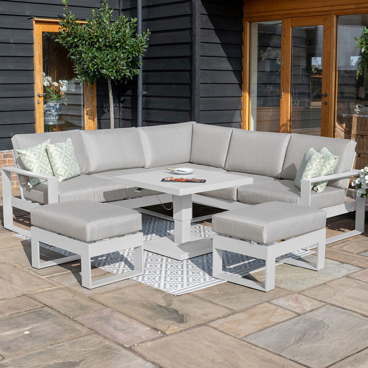 Maze Outdoors Amalfi Small Corner Dining with Square Rising Table and Footstools / White House of Isabella UK
