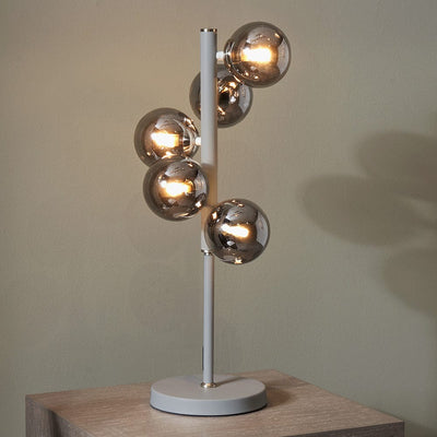 Pacific Lifestyle Lighting Blair Smoke Glass Ball and Grey Metal Table Lamp | OUTLET House of Isabella UK