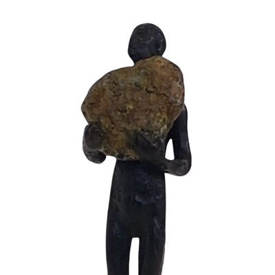 Bronze Figure On Rock High